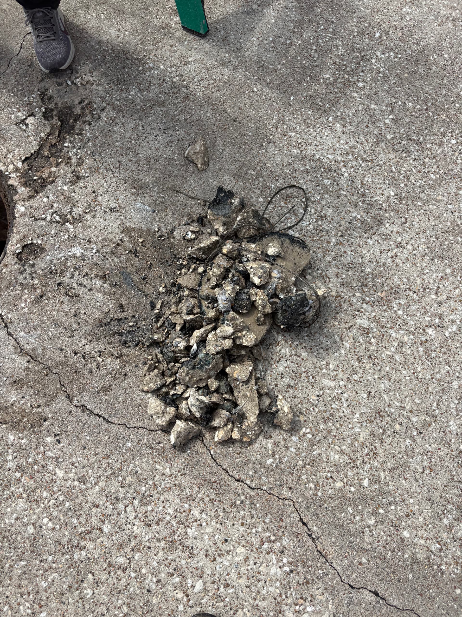 Gallery photos for Asphalt Blockage Cleared from Pearland Sewer Line: Image #1